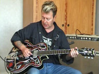 Brian Setzer on rockabilly picking using open chords